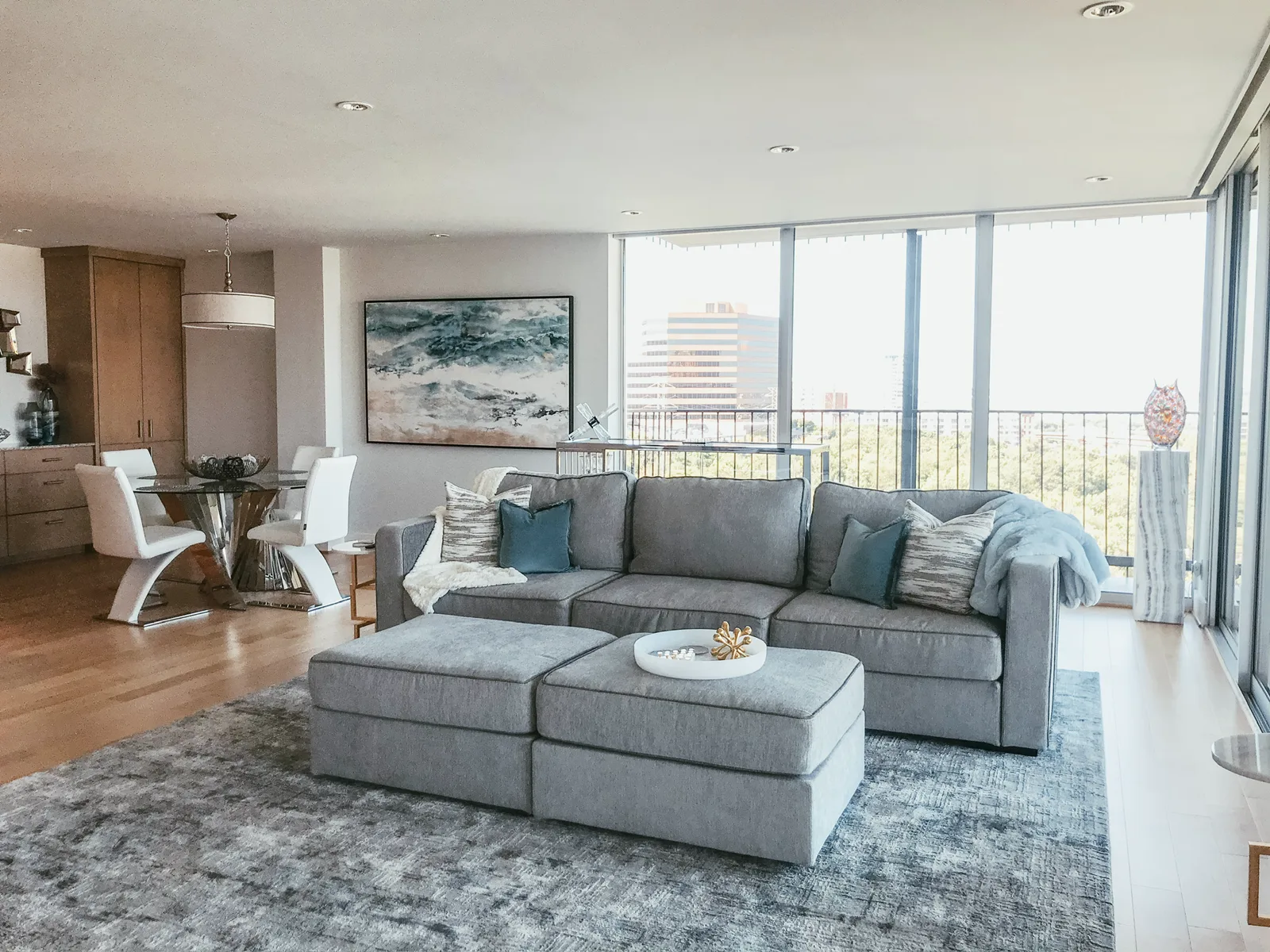 High-rise living room above the Dallas treetops at Fairmount Street